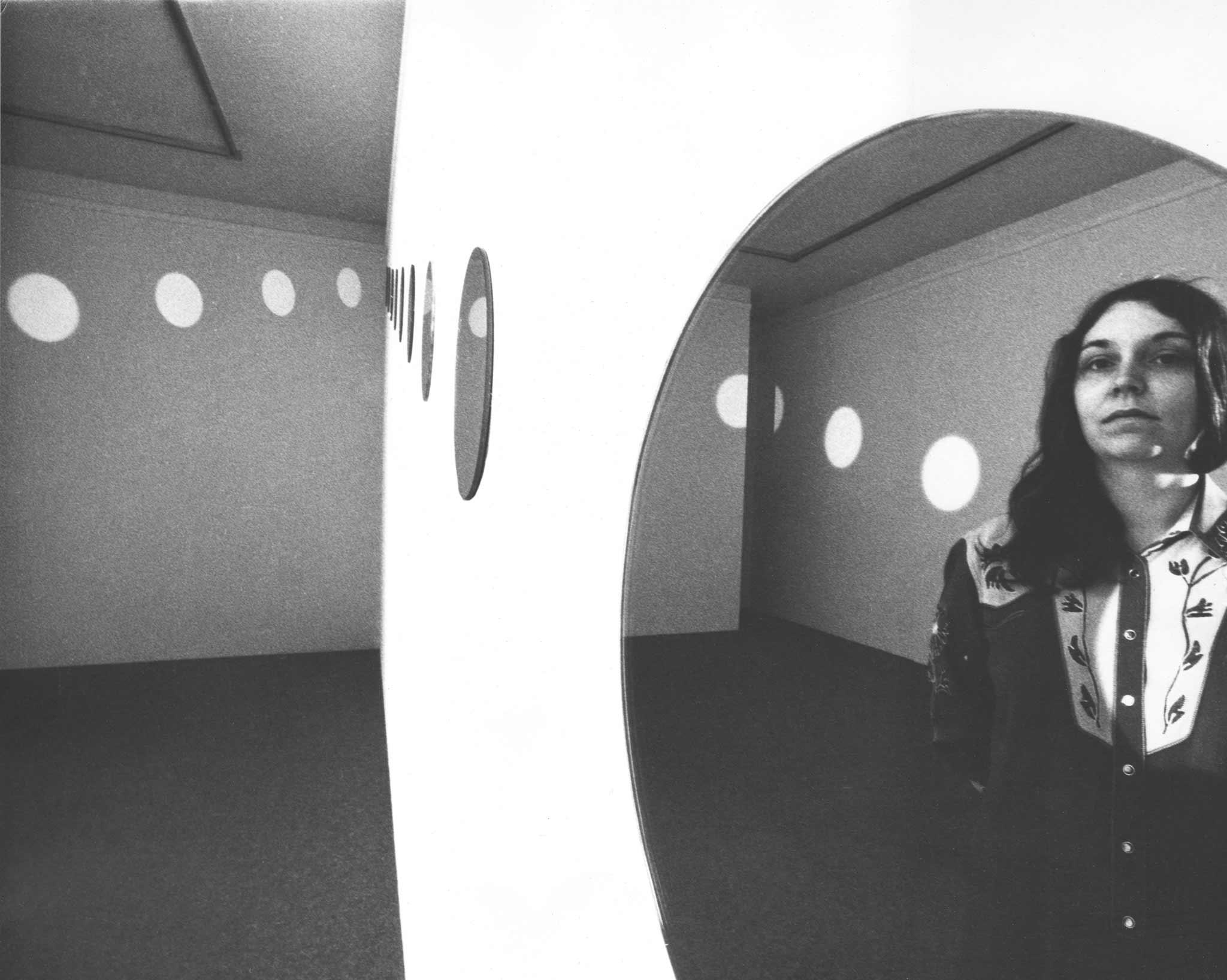 Nancy Holt with Mirrors of Light II at Walter Kelly Gallery, Chicago, Illinois, in 1974.