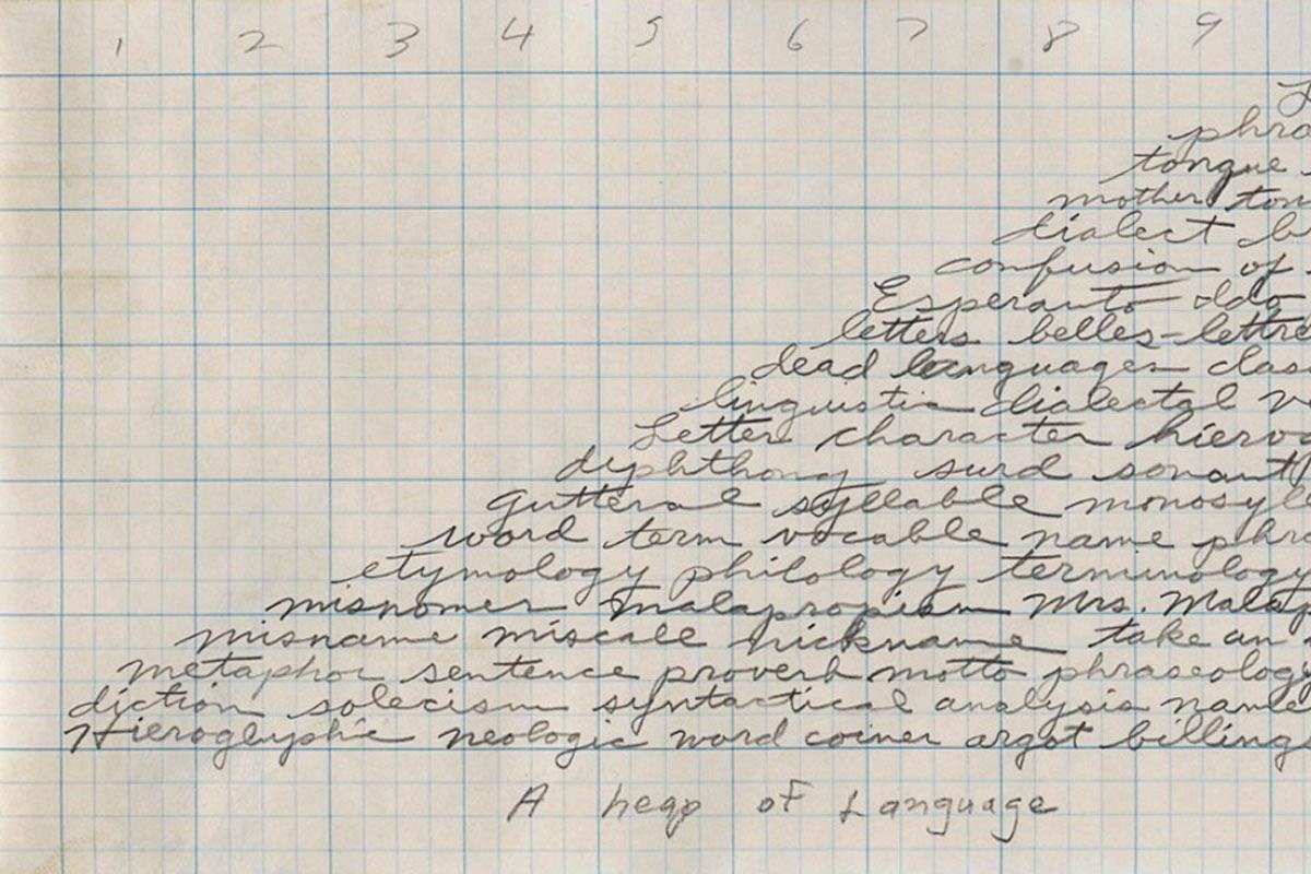 A graphite drawing on graph paper of a pyramid shape created by handwritten cursive text