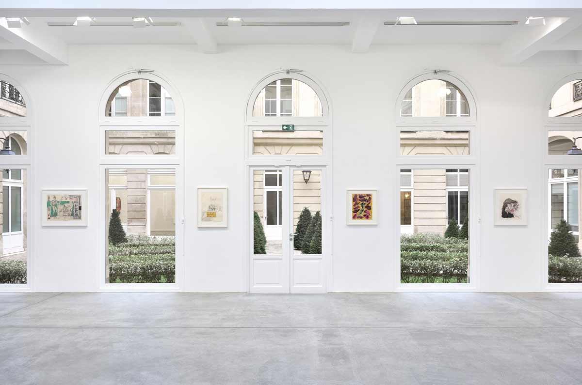 an installation view of Galerie Marian Goodman in Paris showing four drawings by Robert Smithson