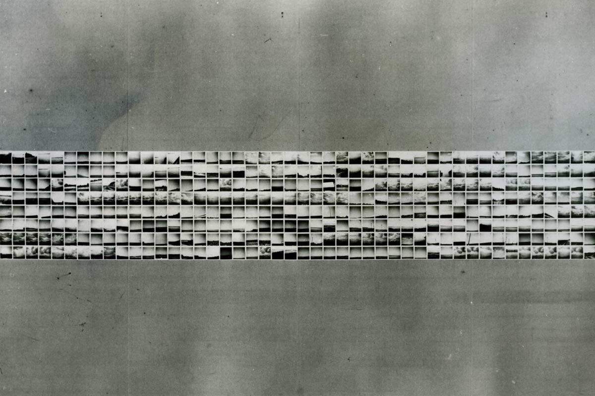 a collection of 400 small images on a gray wall