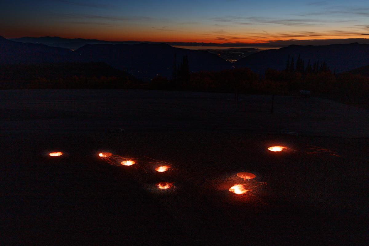 a constellation of the big dipper made of fire pits
