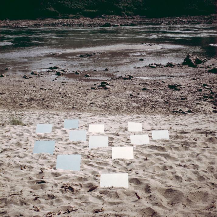 square mirrors on a sandy beach