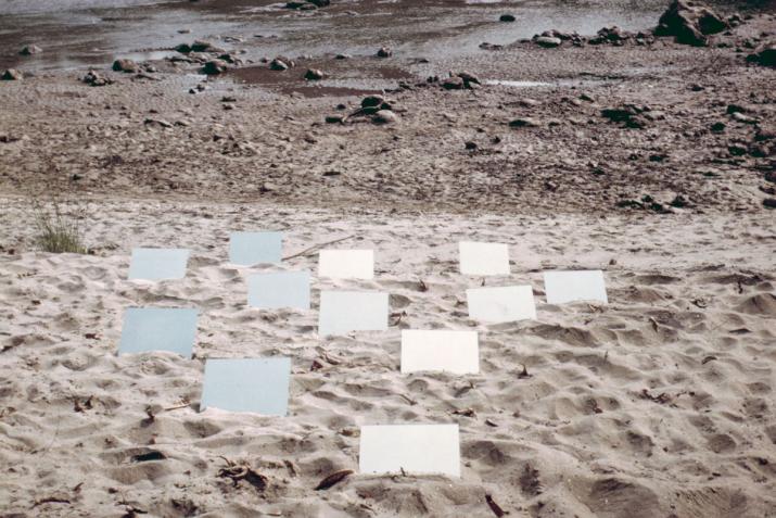 square mirrors on a sandy shore