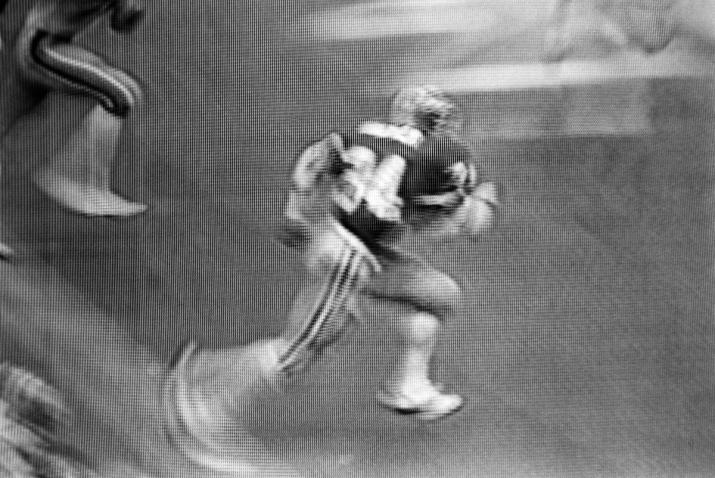 a football player running to the right