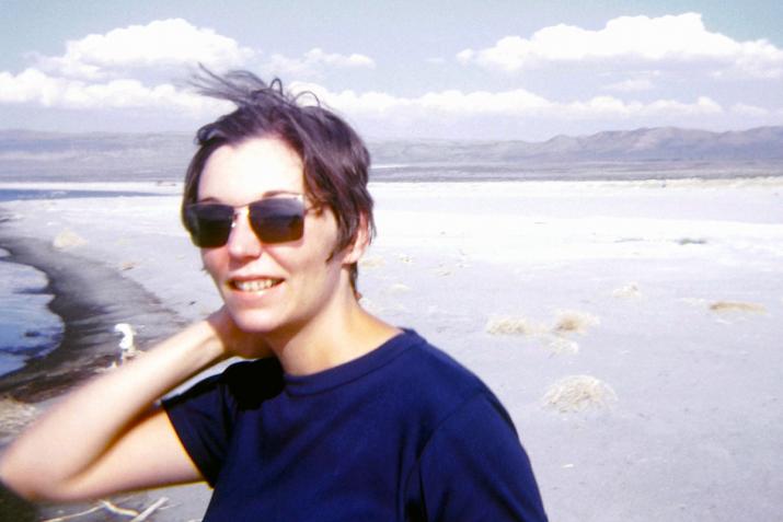 Nancy Holt standing at a lake shore in California