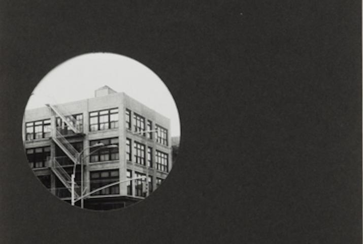 a building seen in a circle