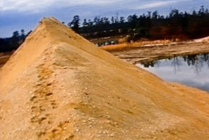 footprints on a sand dune