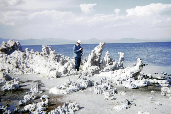 a white man in a white cowboy hat beside Mono Lake