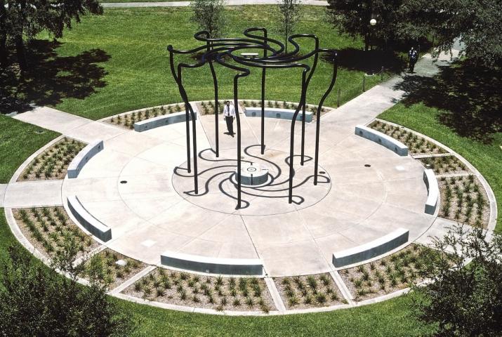 a sculpture on a university campus