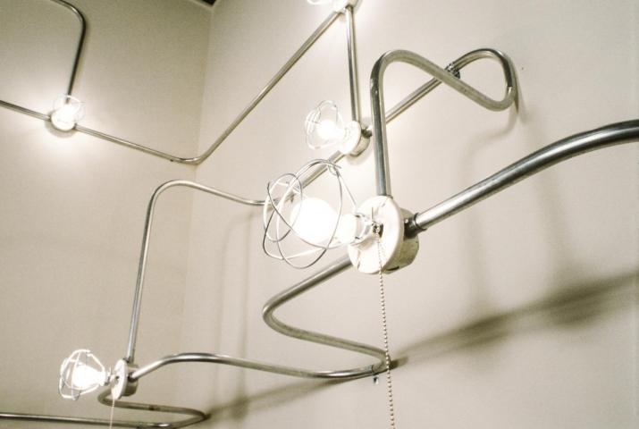 a sculpture made of light bulbs
