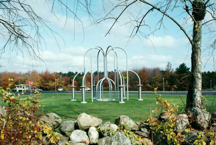 an outdoor sculpture in teh form on an industrial device