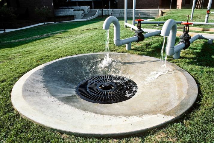 a sculpture made of water piping