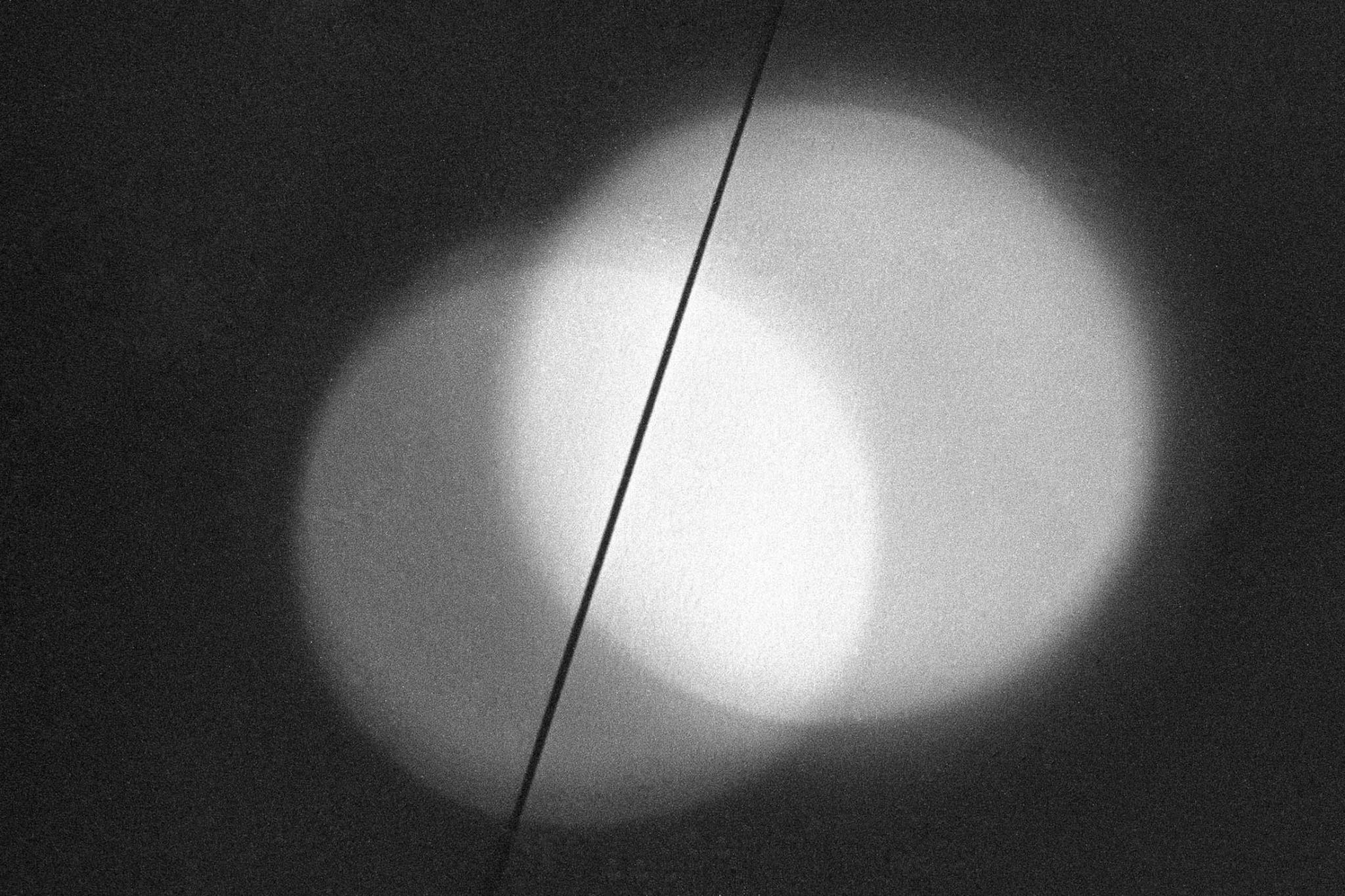 Photograph of circular light projection on wall
