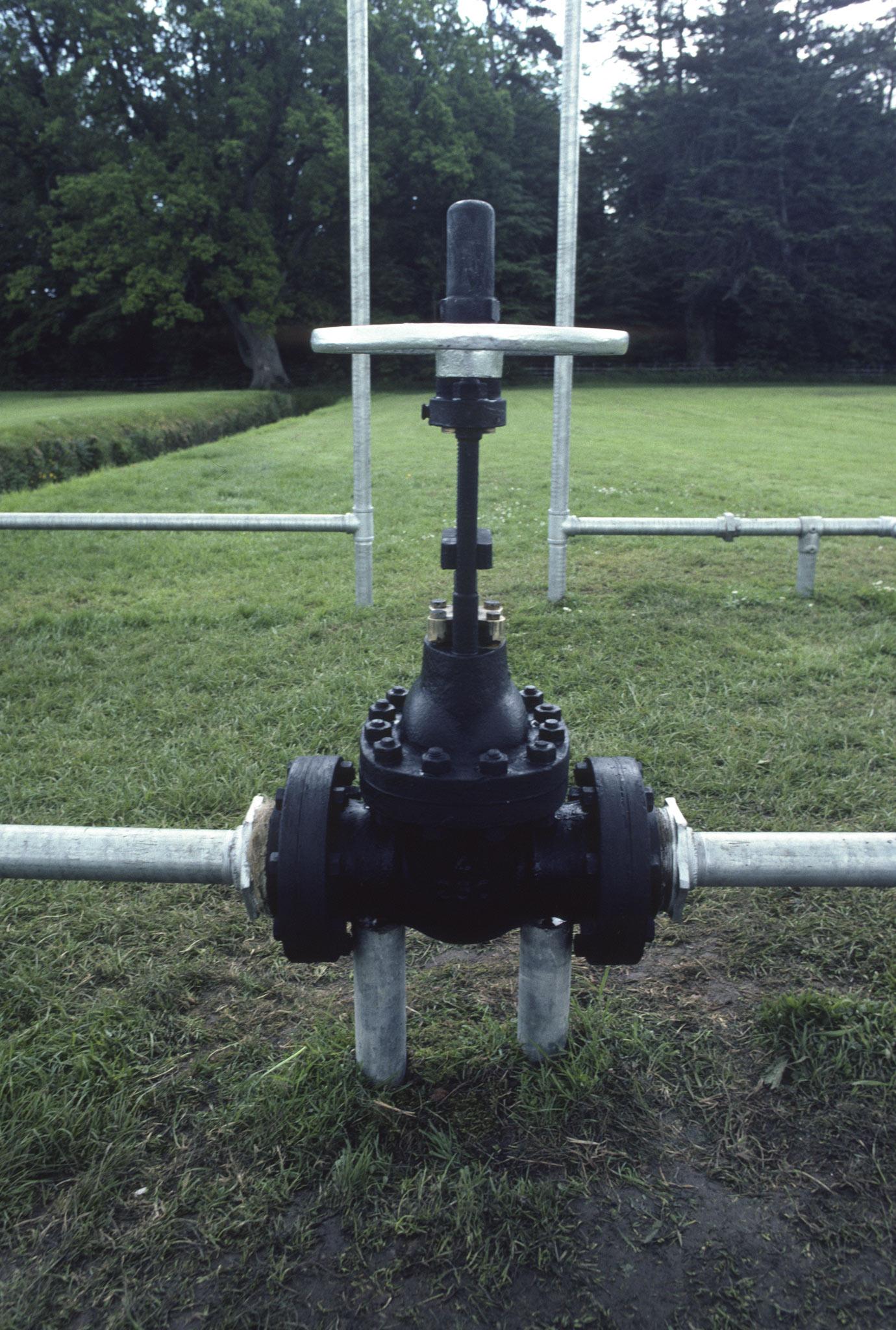 a valve that can be turned by hand to turn water on and off through galvanized steel pipes