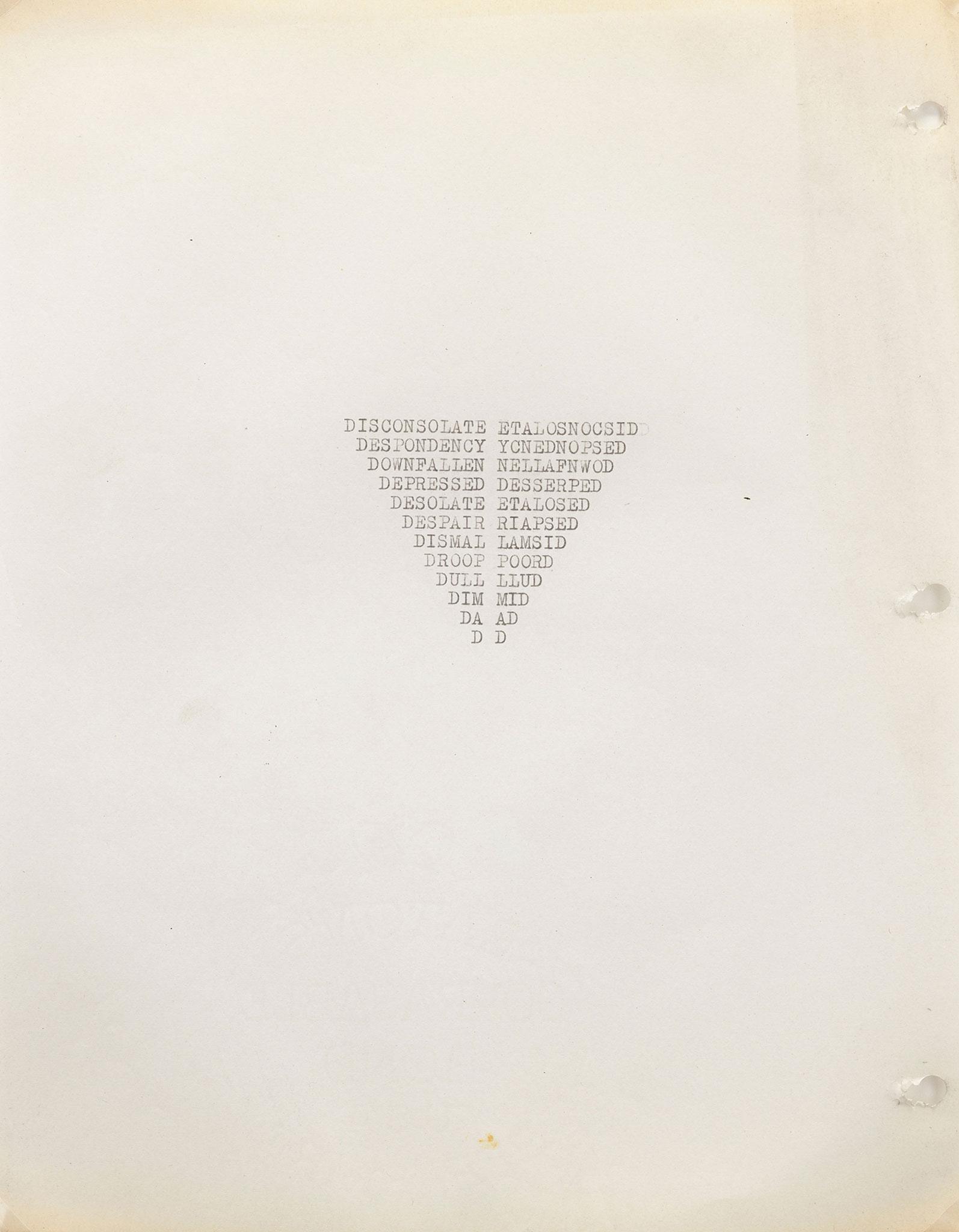 a yellowing piece of letter size paper with words typewritten in the shape of an inverted triangle in the center of the paper