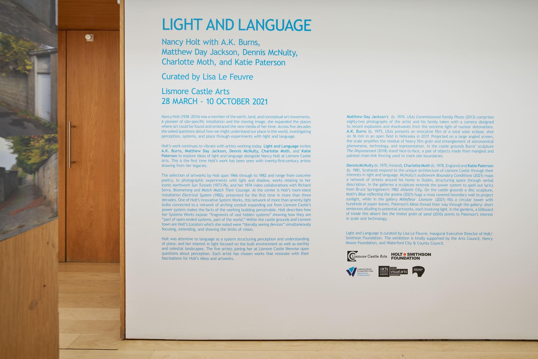 a wall text for the exhibition Light and Language on a gallery wall