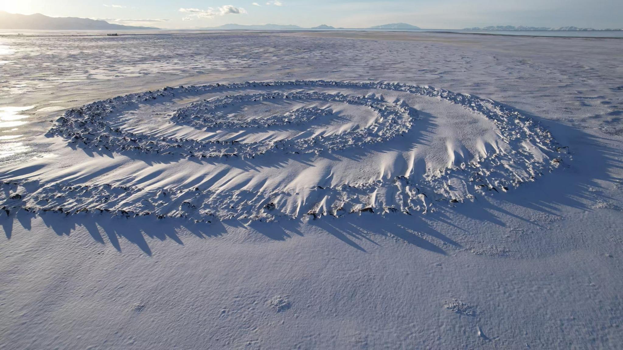 the spiral jetty covered in snow 