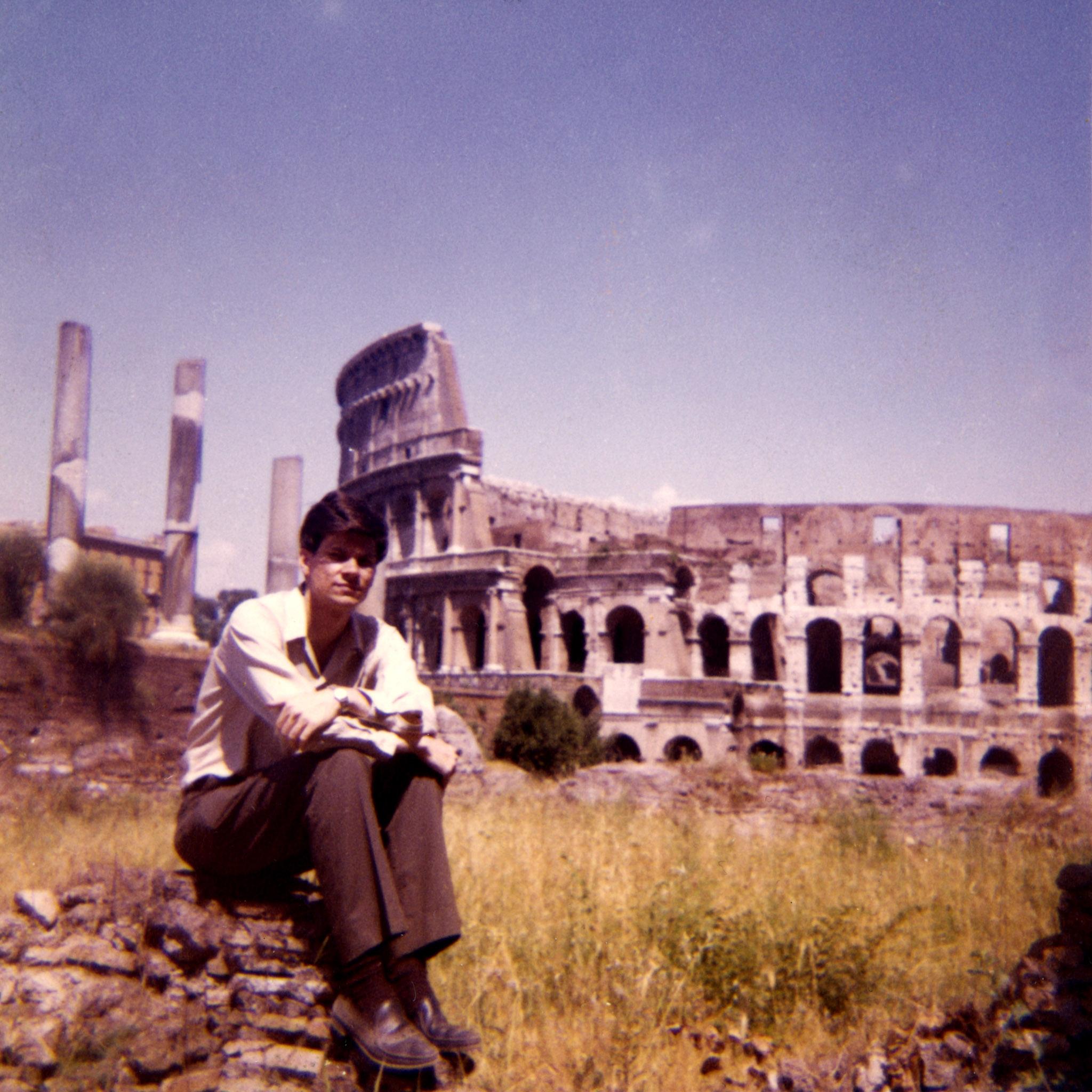 Robert Smithson seated outside the Colosseum in Rome