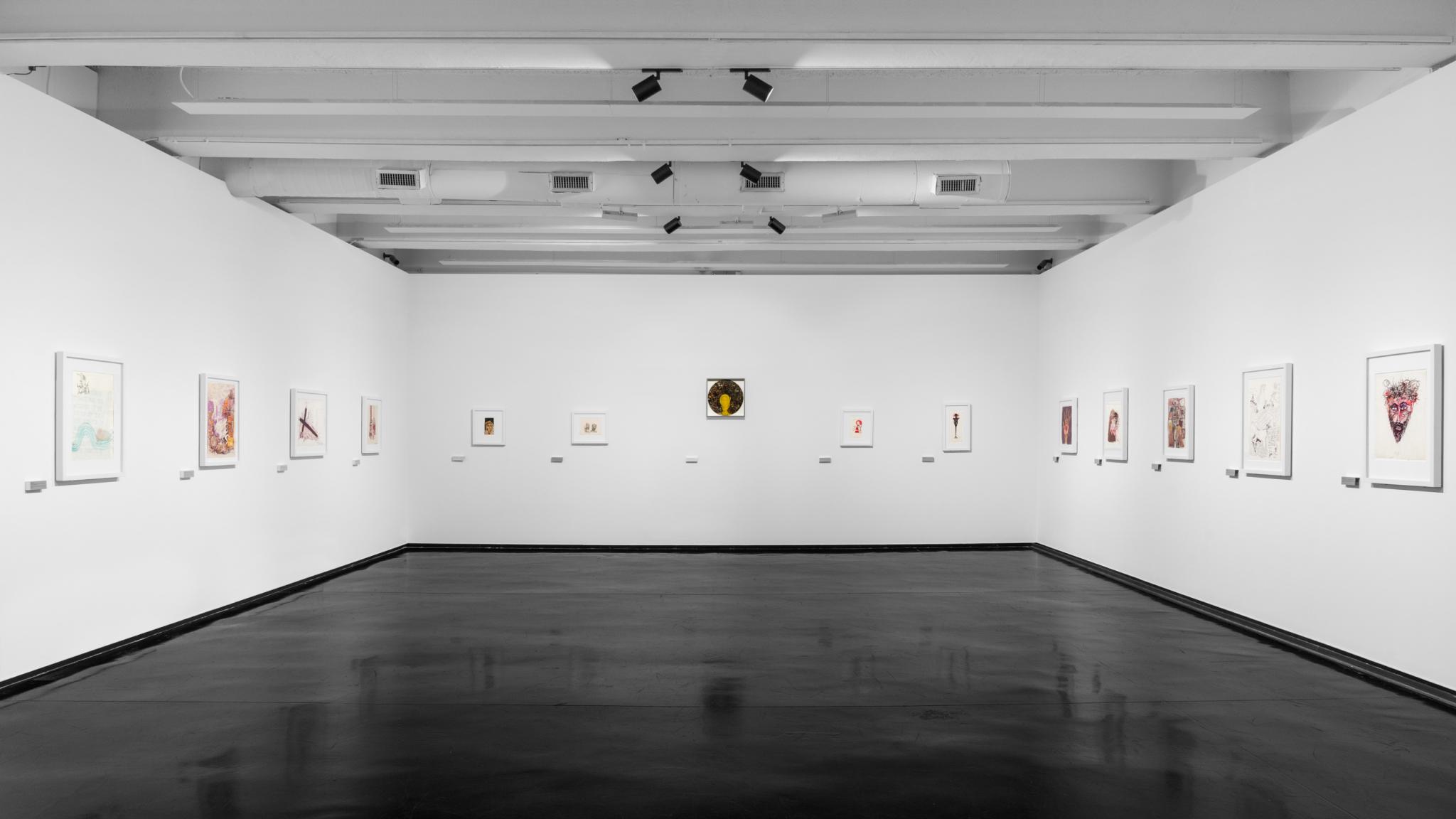an installation view of Smithson drawings on view at MACRO Rome