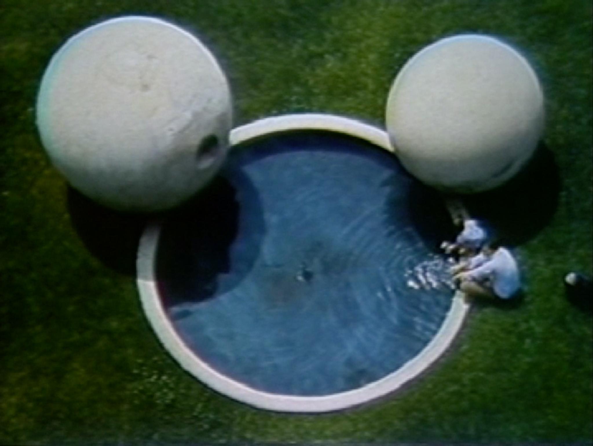 aerial view of Dark Star Park, two large spheres and a circular pool