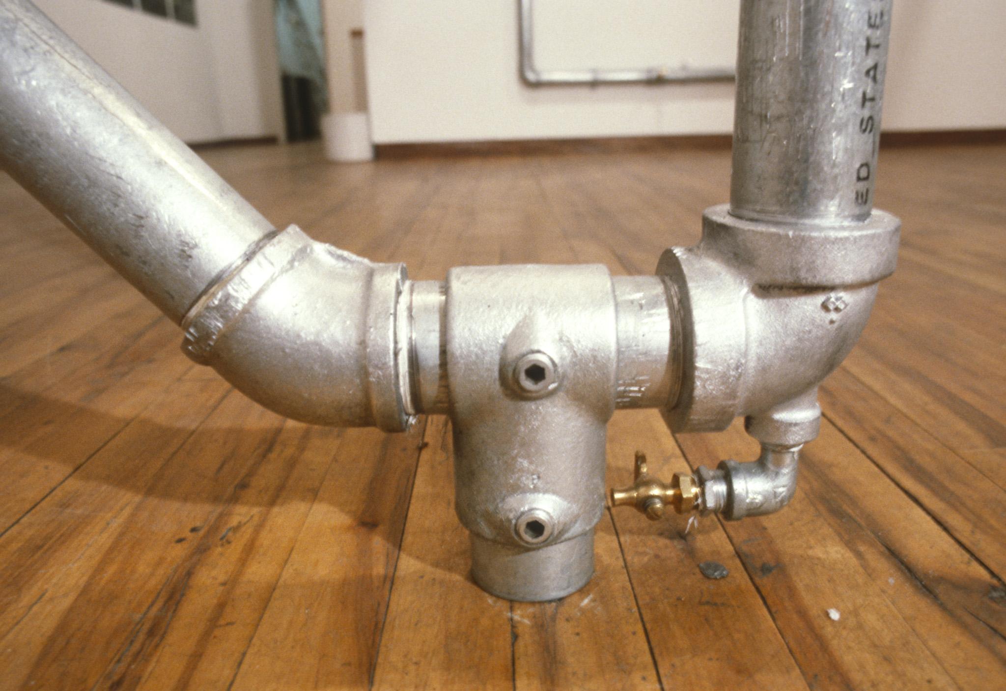 Nancy Holt's sculpture called Hot Water Heat made of hot water pipes in the John Weber Gallery in New York