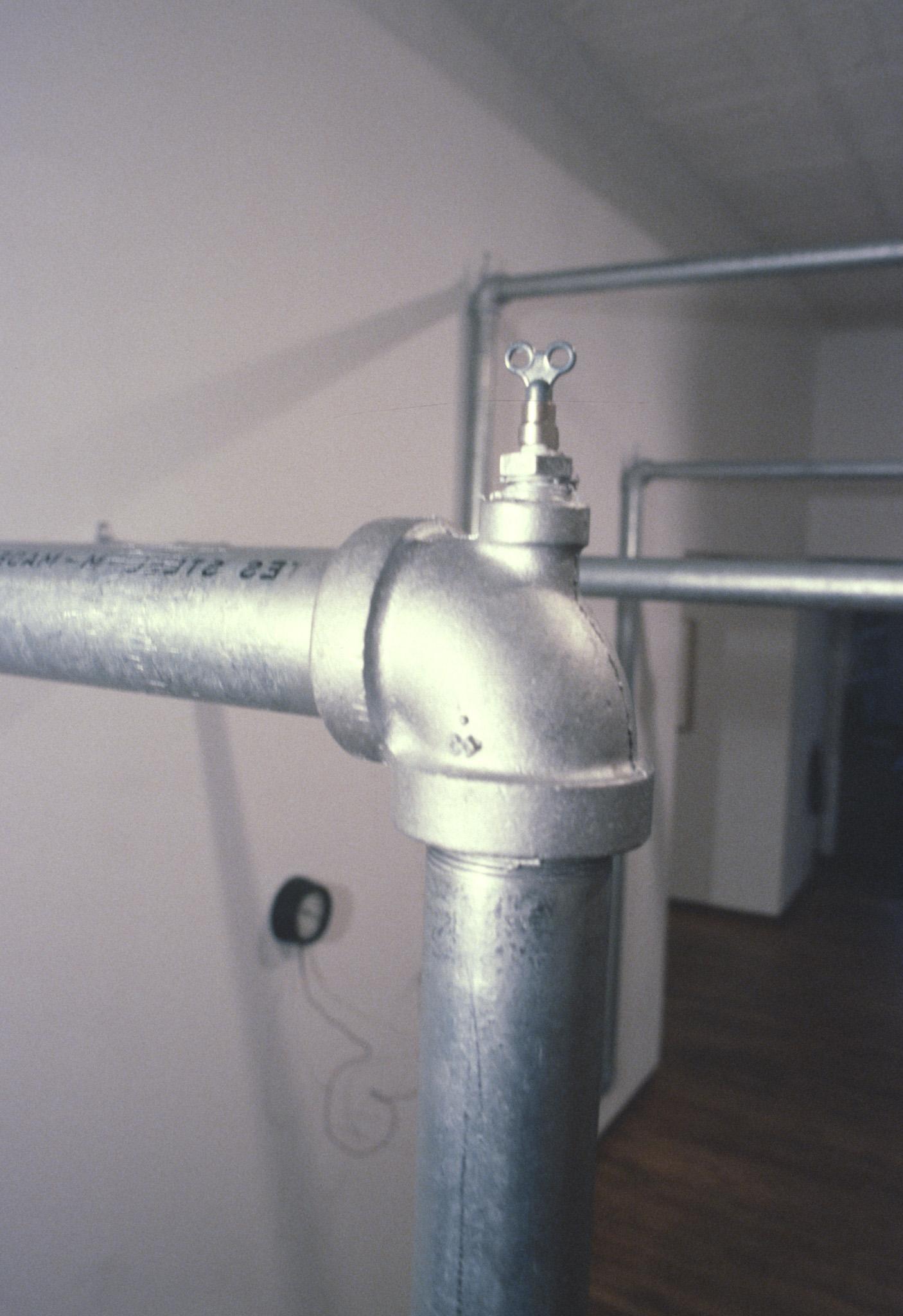 Nancy Holt's sculpture called Hot Water Heat made of hot water pipes in the John Weber Gallery in New York