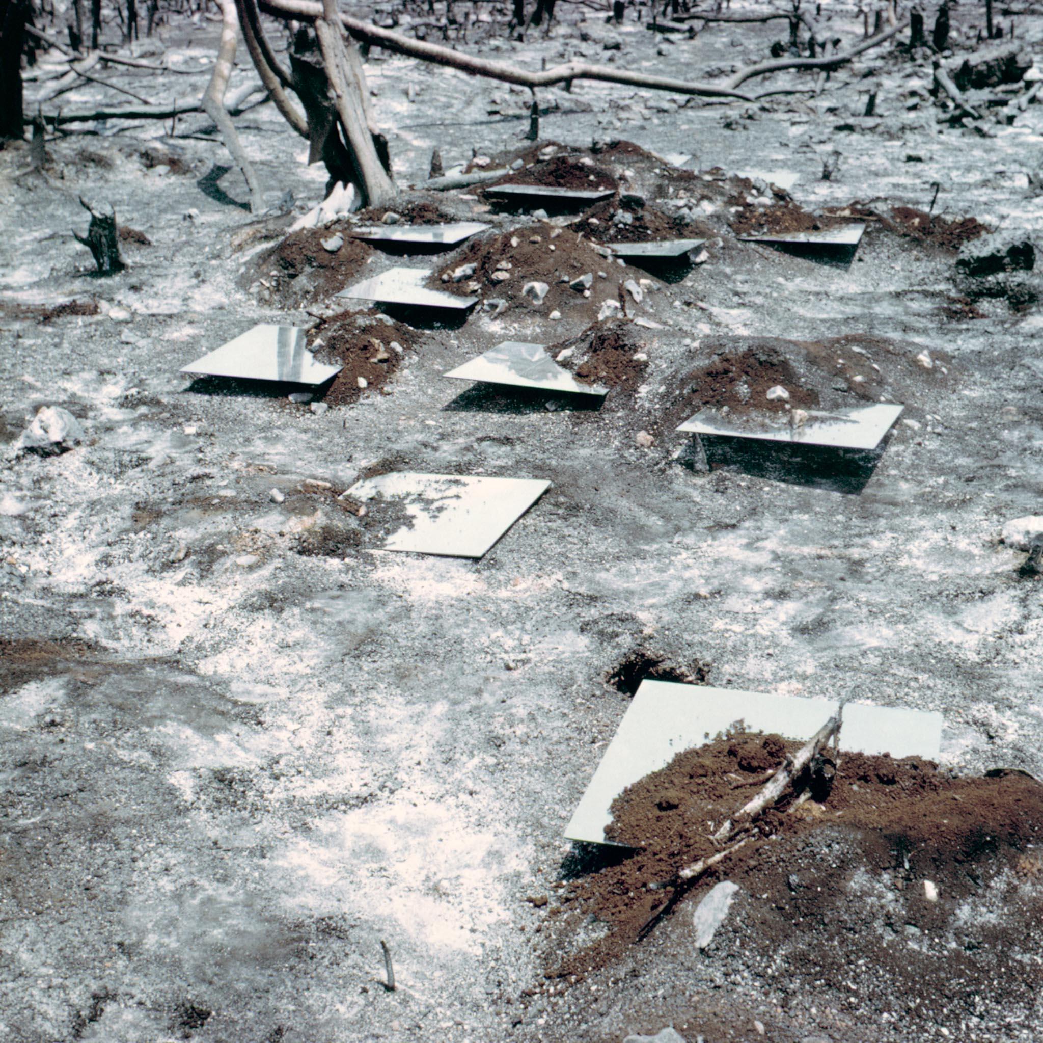 square mirrors in dry earth