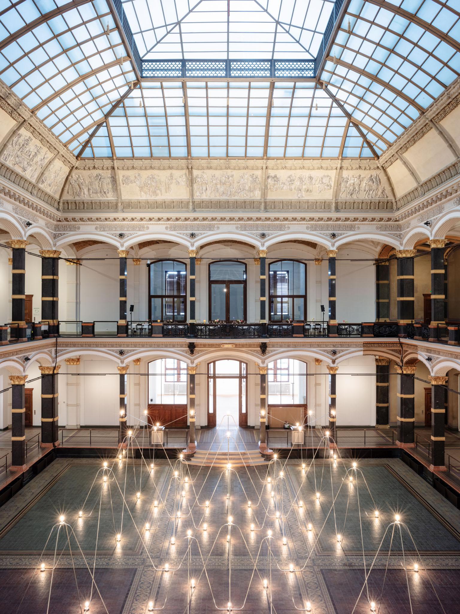 Nancy Holt's Electrical System made of conduit and lightbulbs installed in Gropius Bau