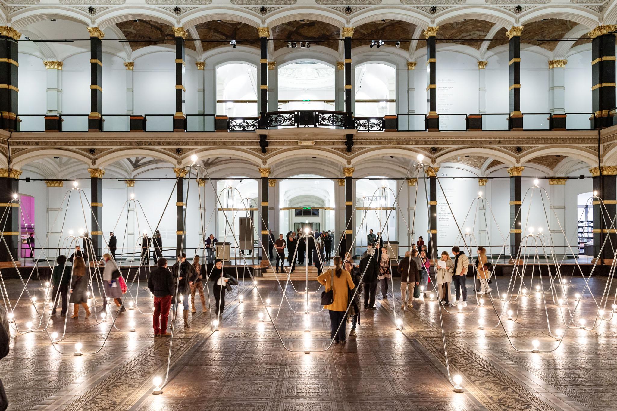 Nancy Holt's Electrical System made of conduit and lightbulbs installed in Gropius Bau