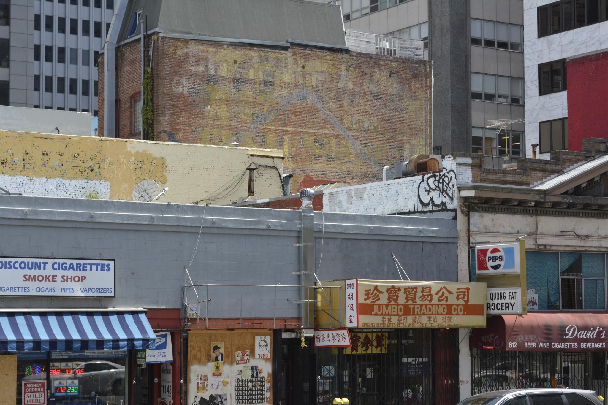 an urban scene with a ventilation artwork by Nick Raffel
