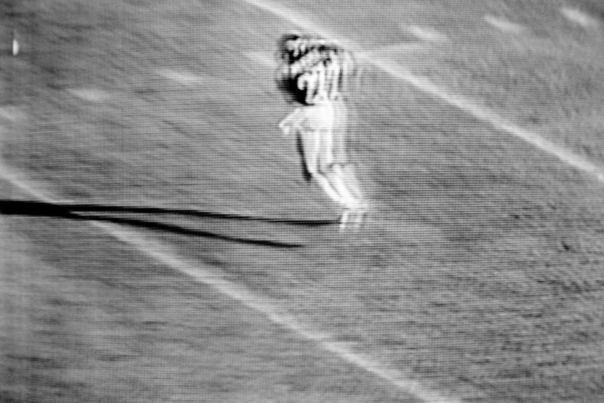 images of a broadcast professional football game showing the grain of the television