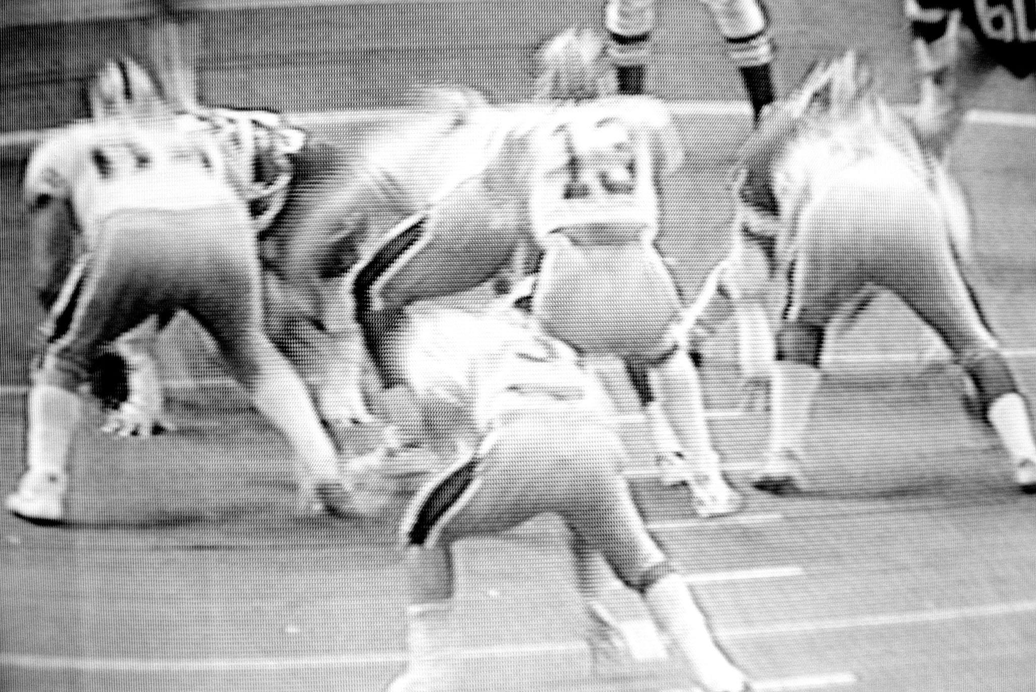 images of a broadcast professional football game showing the grain of the television
