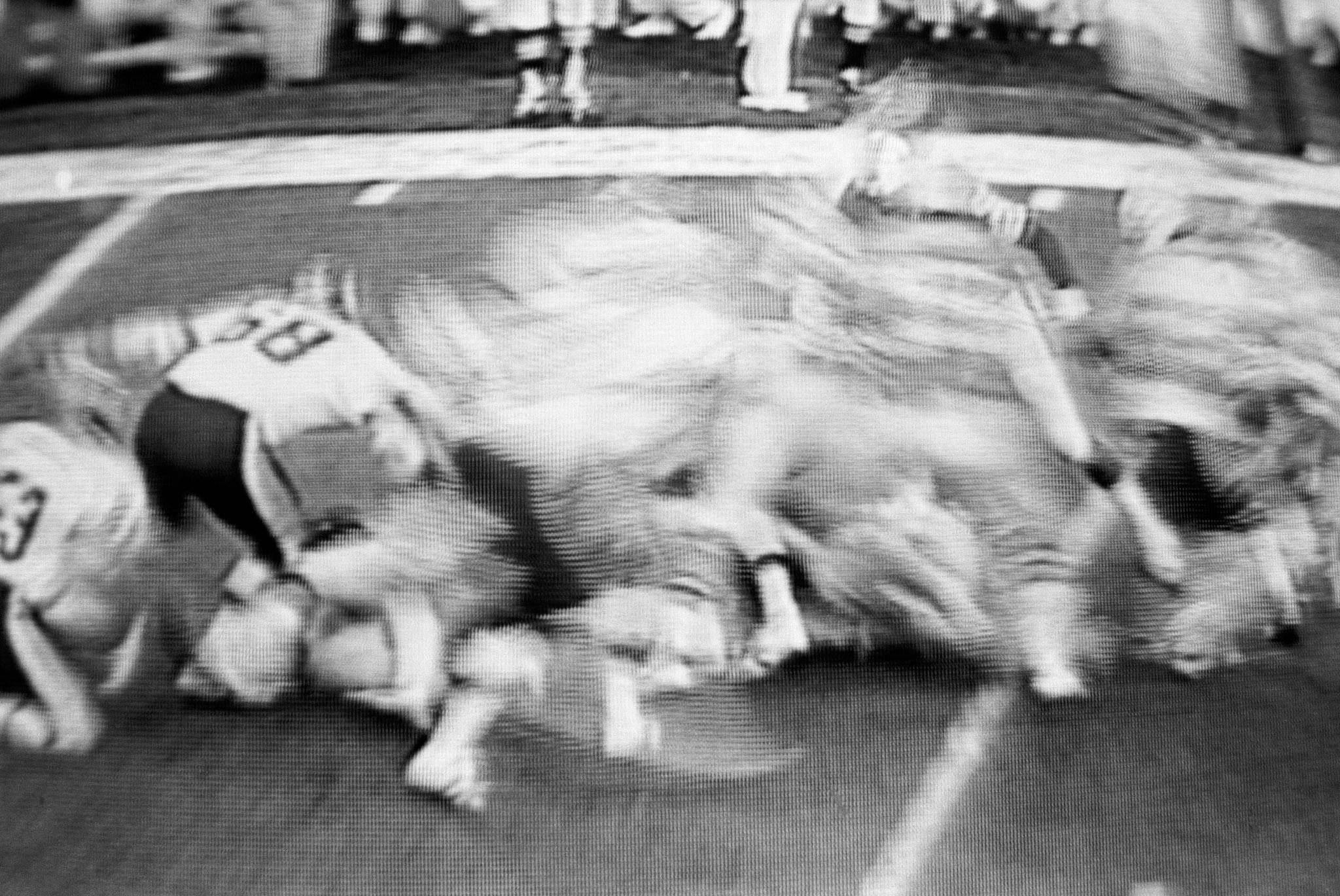 images of a broadcast professional football game showing the grain of the television