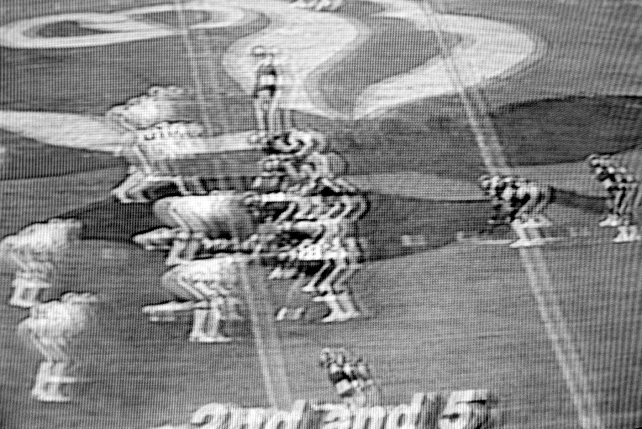 images of a broadcast professional football game showing the grain of the television