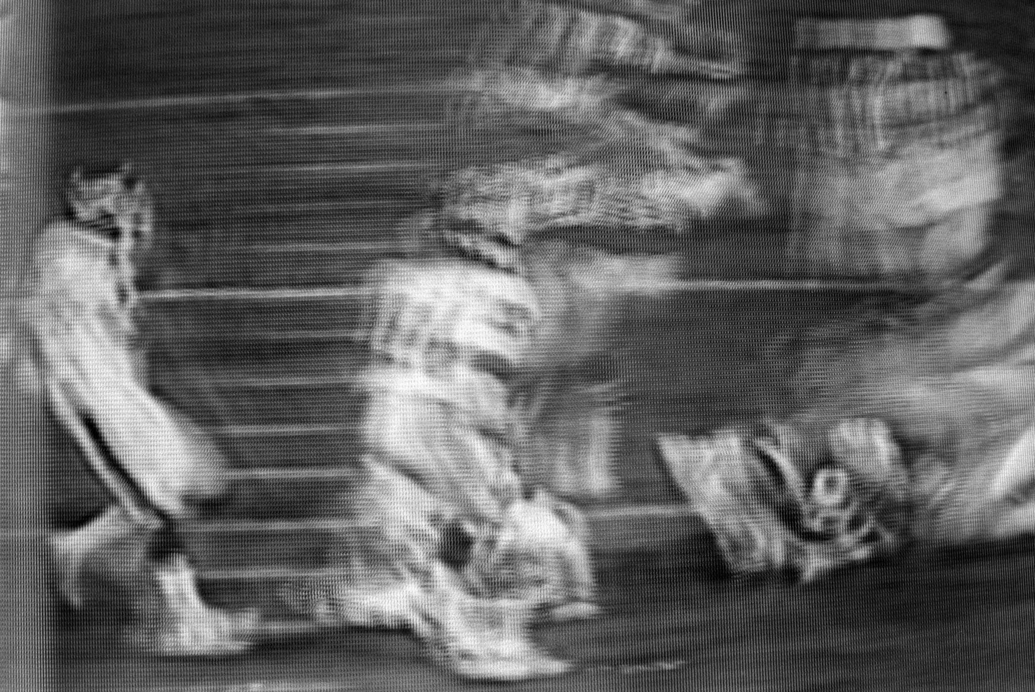 images of a broadcast professional football game showing the grain of the television