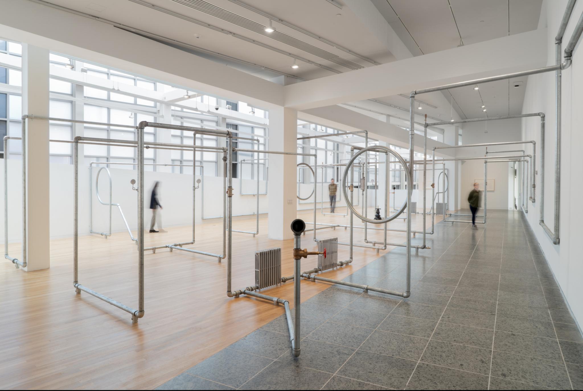 A gallery full of sculptural steel pipes 