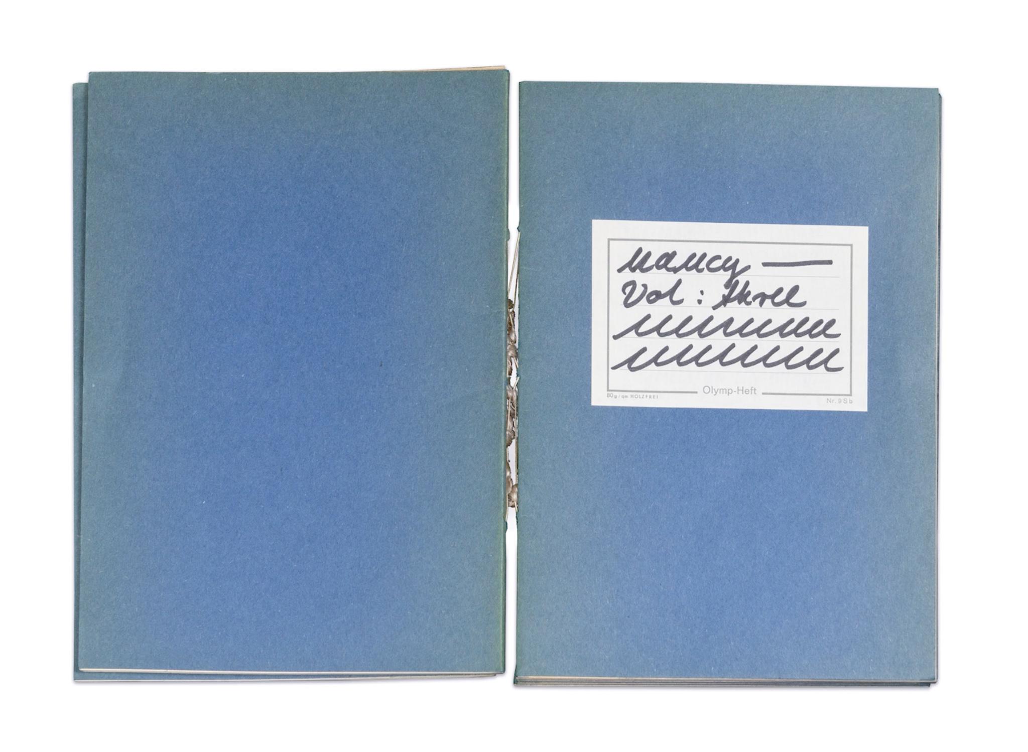 a book filled with simple looping graphite lines