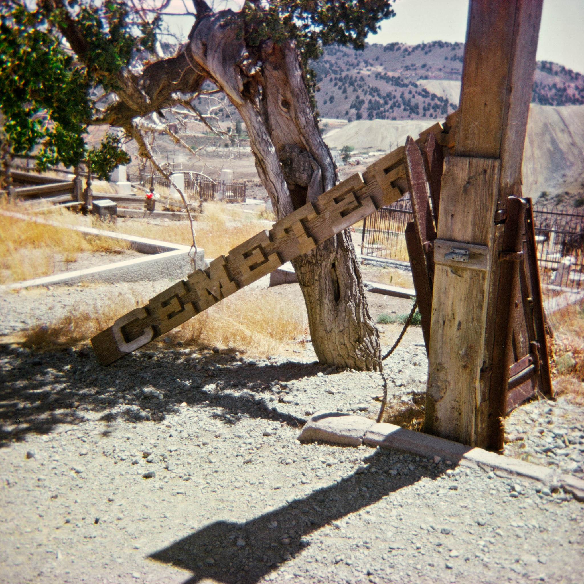 gravesite in a rural western landscape