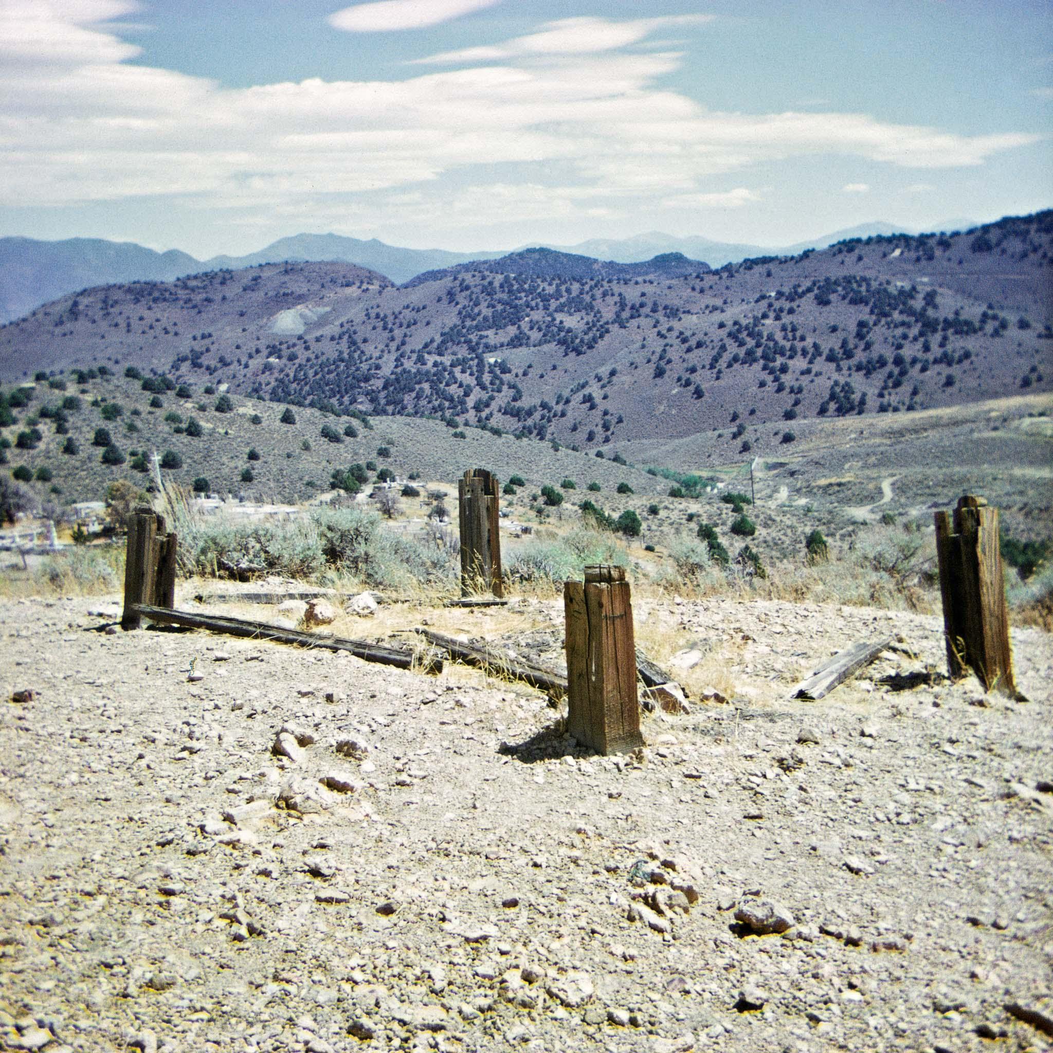 Gravesite in a rural western landscape