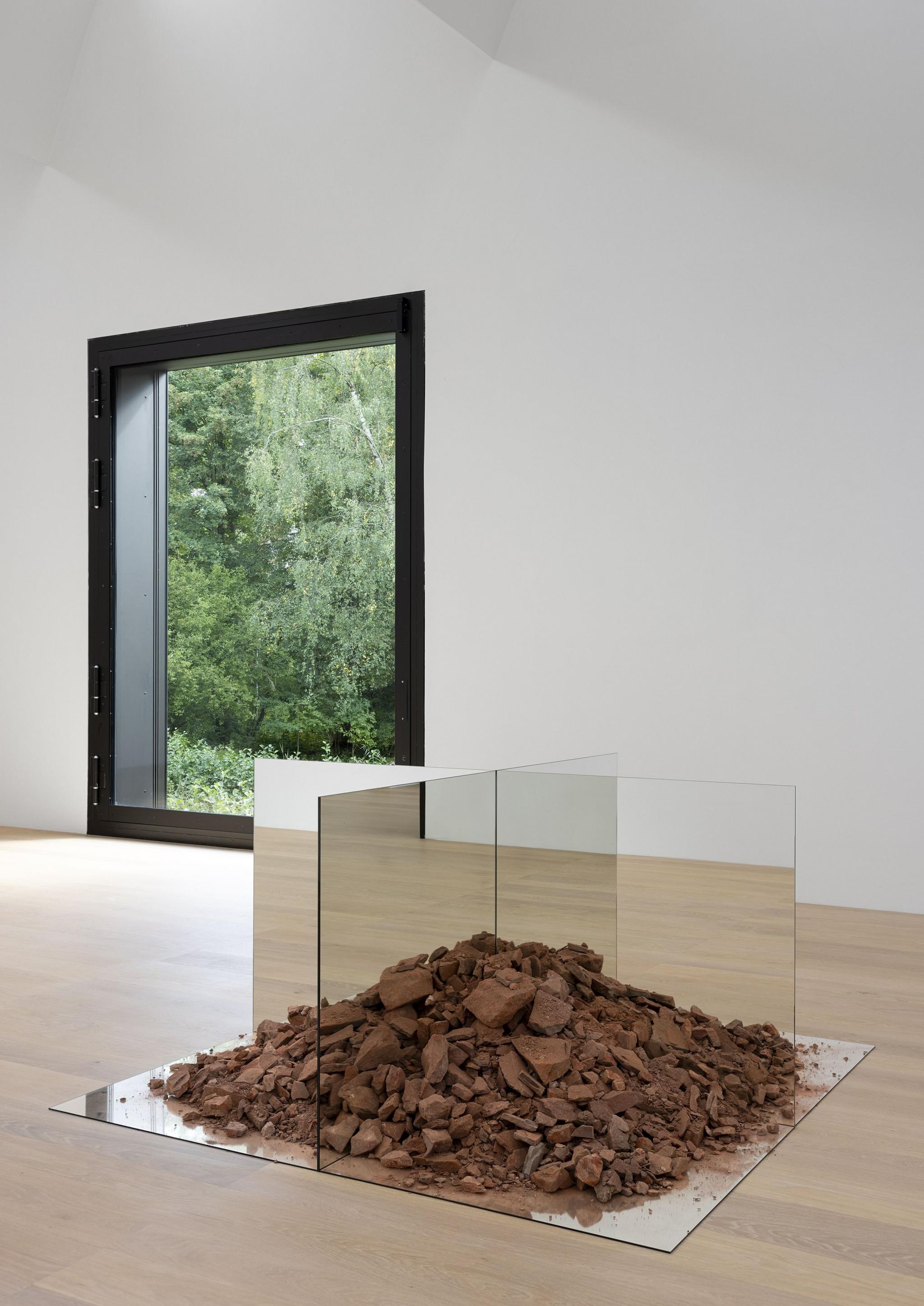 an installation of Robert Smithson artworks in a museum