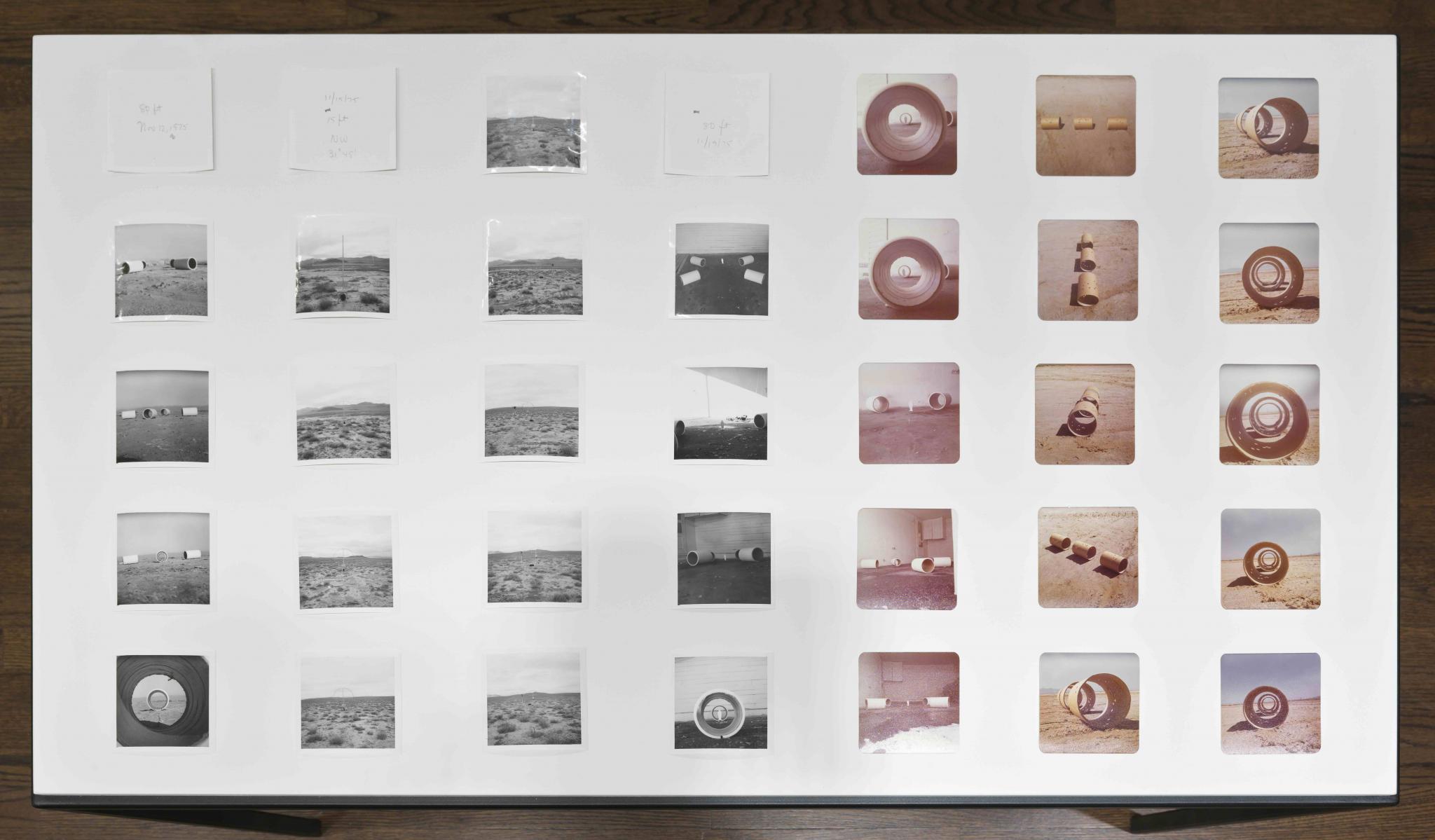 series of Instamatic photographs of a model, seen in a vitrine