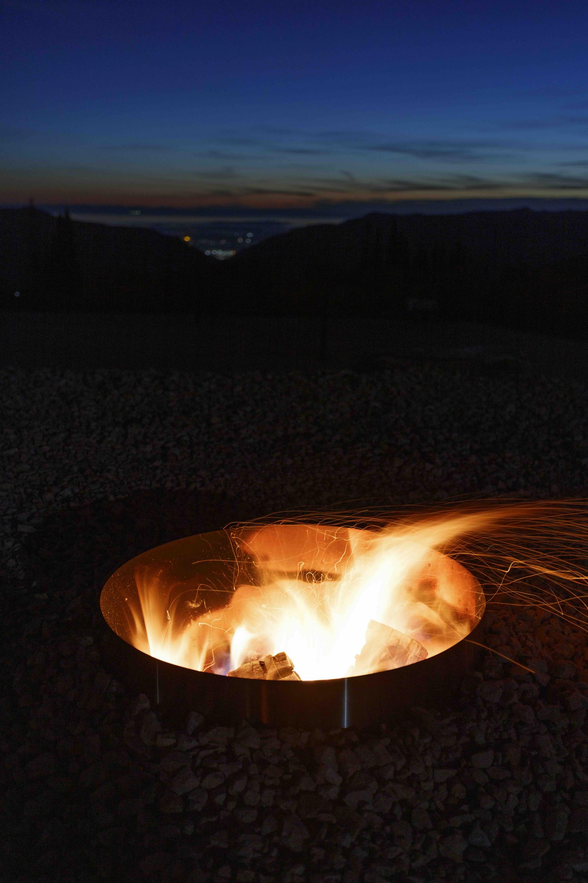 fire pits in the outline of a star constellation
