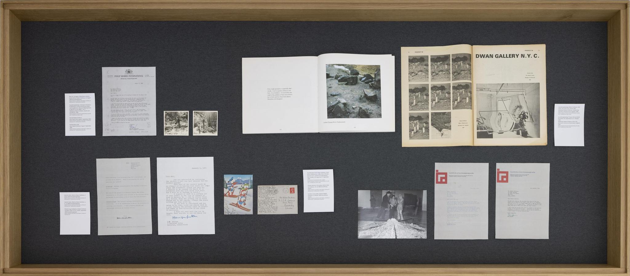 a showcase of letters and magazines