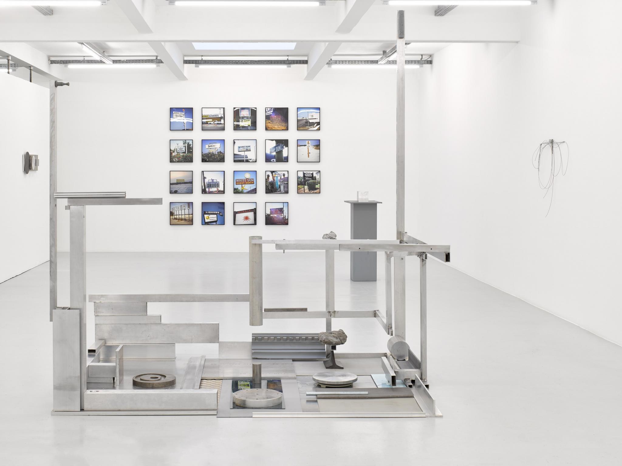 an exhibition in a white walled gallery