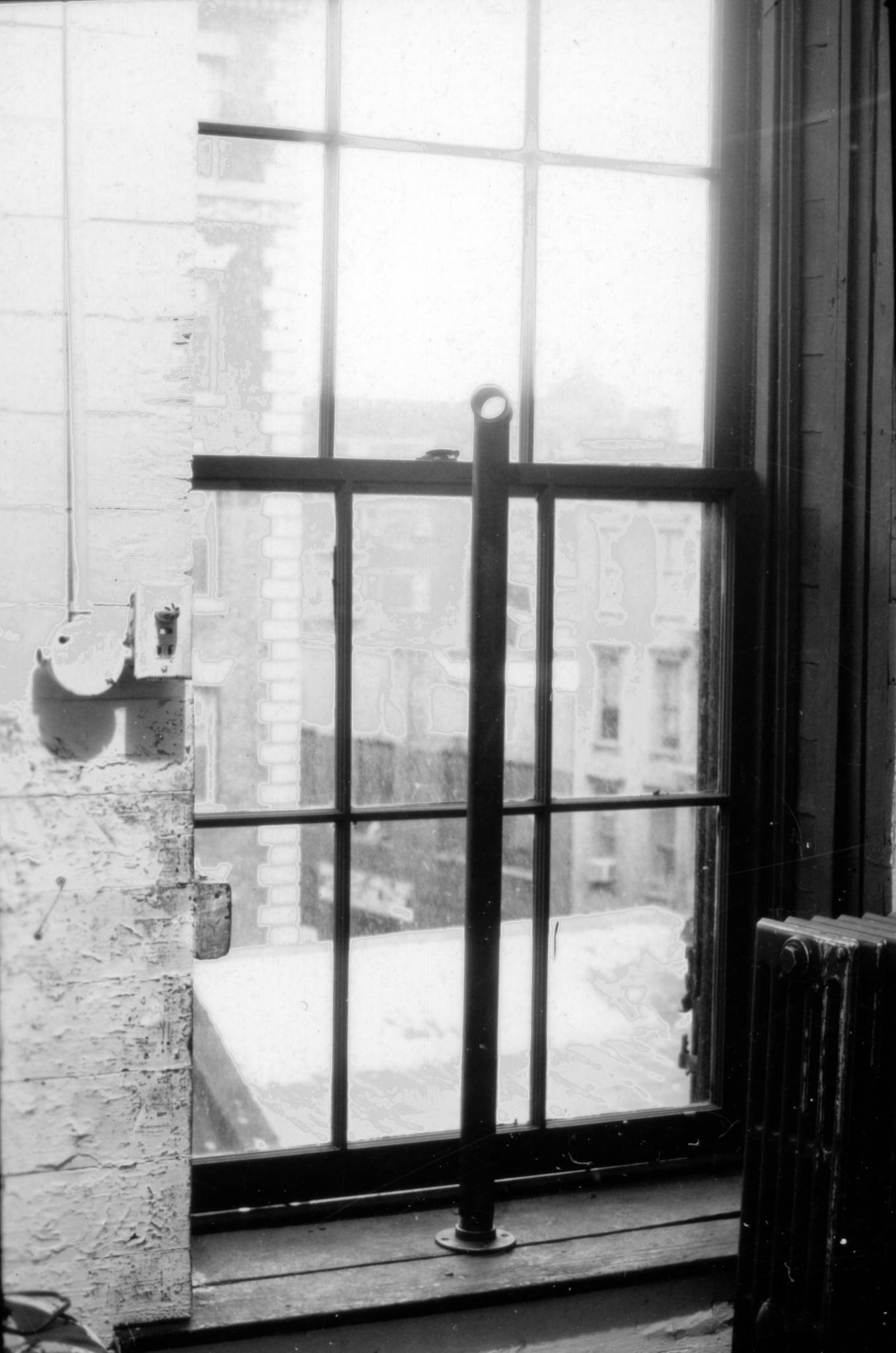 a steel pipe in a window sill