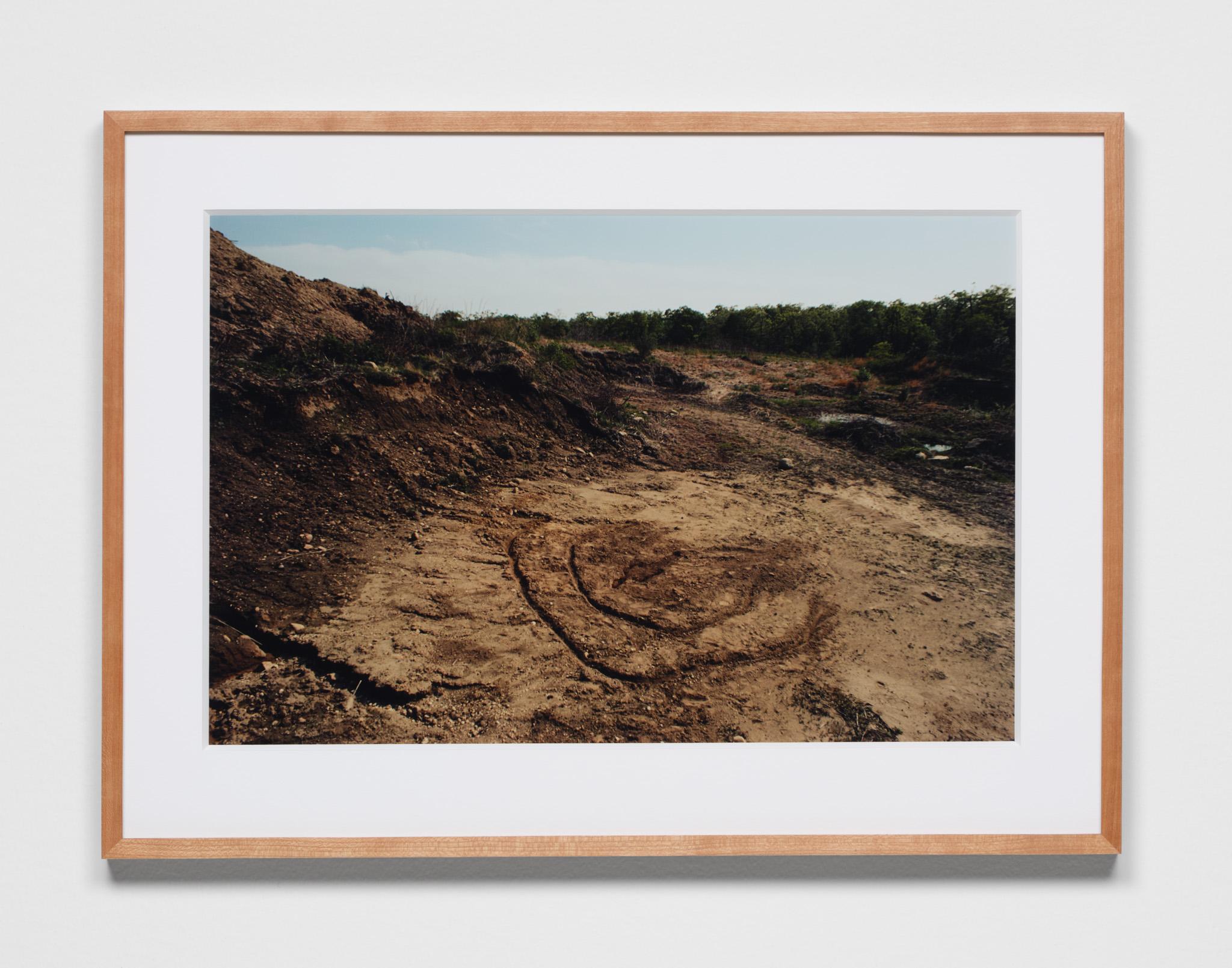 Casting a Glance: Dancing with Smithson, Marian Goodman Gallery, Los Angeles, CA, 2025 featuring a color photograph of stones laid out in a shape of a heart by Ana Mendieta