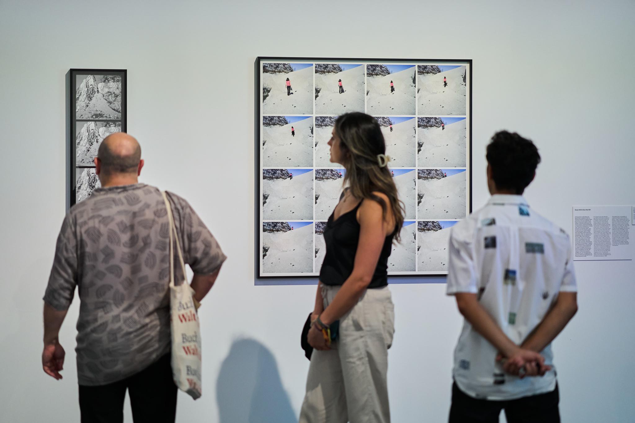 people looking at art in a museum