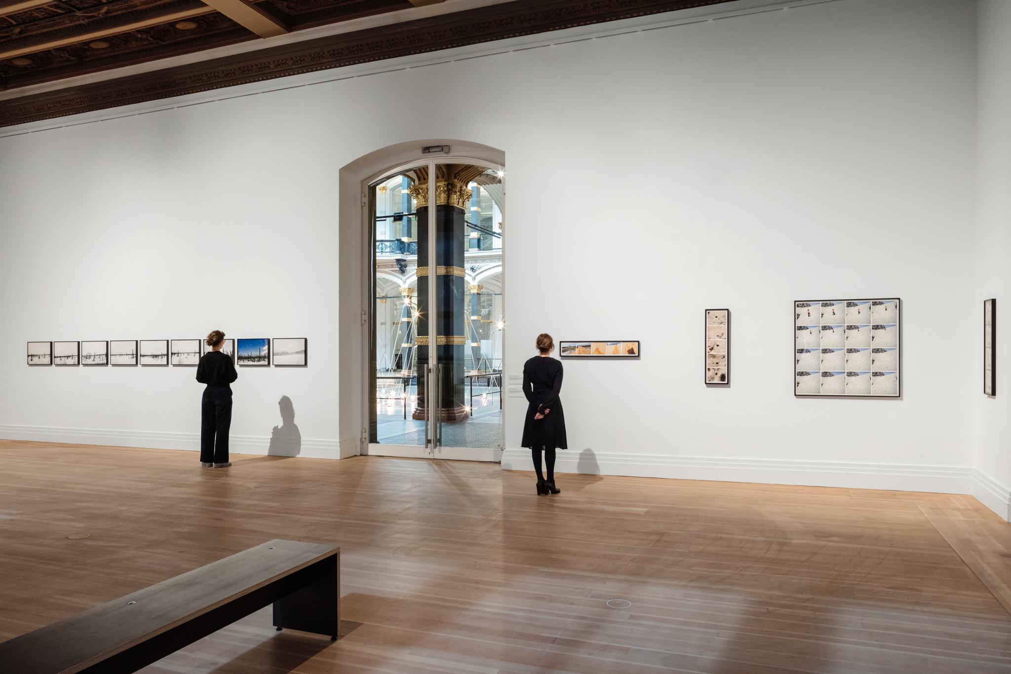 people looking at art the museum