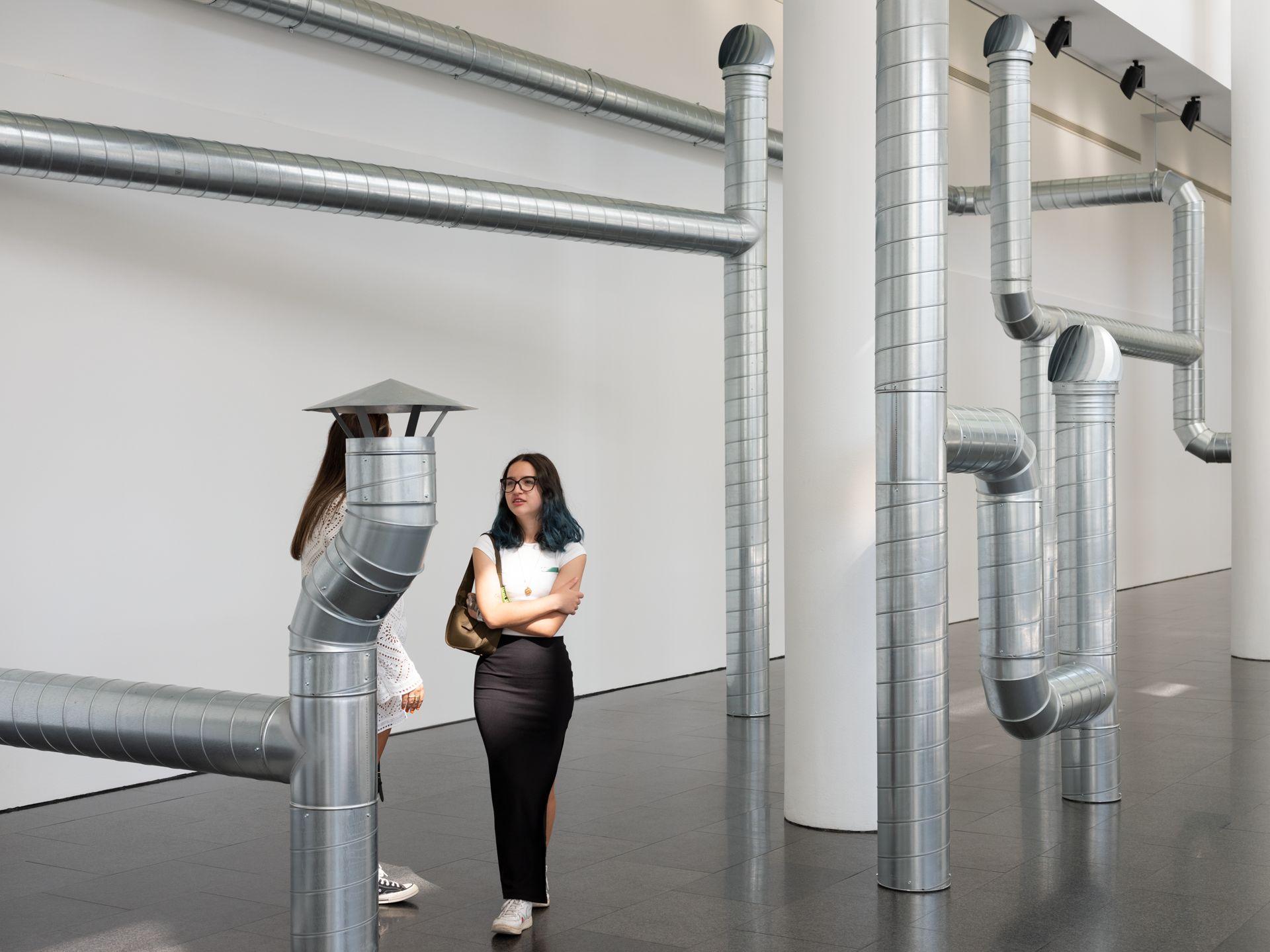 artwork made of ventilation ducting in a museum