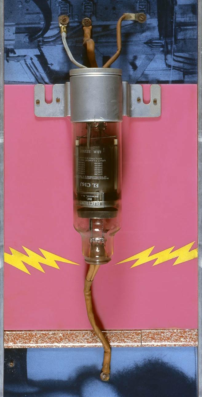 a machine on a hot pink background 